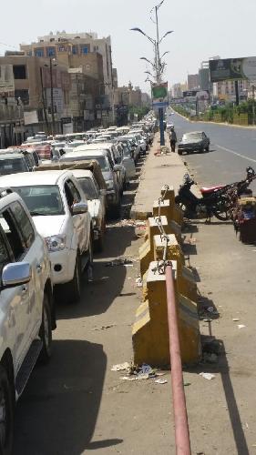 Cars lined up in a fuel station in Sanaa