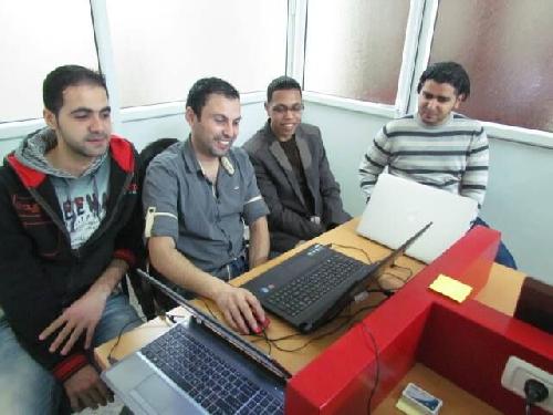 Students accessing a computer equipment at MC