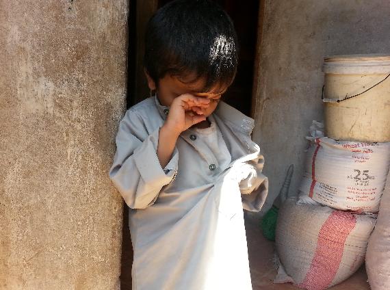 A displaced child from Sada'a. Abduallah was crying because her mother couldn't give him 20 Riyals to buy Lollipop