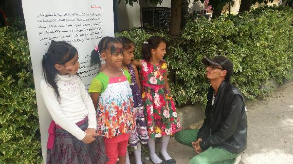 Our Correspondent talking to several orphans in the carnival