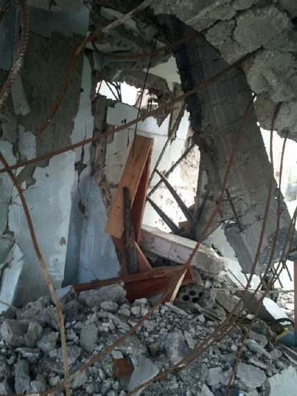 Interior view of home of Ali Nouman Al-Qadsi family destroyed in coalition air strike in Al-Haseb neighbhorhood in August, 2015