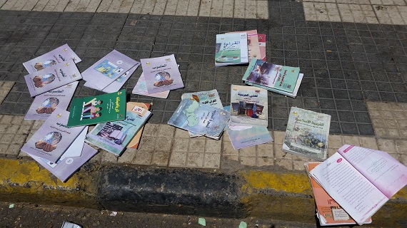 School books on the sidewalk in Tahrir Square - Sana’a, the central black market for school books