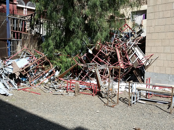 Broken chairs in the backyard in Hayel Saeed An’am High School