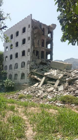 Building damaged in the Berbasha neighborhood