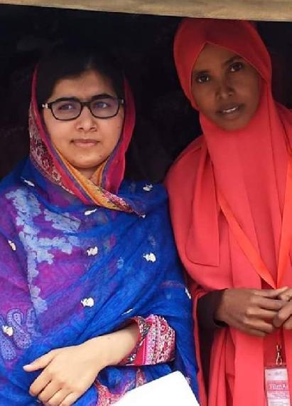 Brownkey Abdullahi (Right) with Nobel Lauriete Malala Yousafzai (Left) – Malala spent her 19th birthday in Kenya’s Dadaab camp in her bid to draw the attention to the global migrant crisis and the plight of those living in the camp.