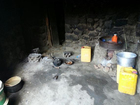 Another view of kitchen with makeshift gas stove.